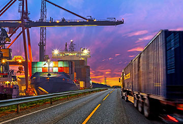 shipping port at dusk